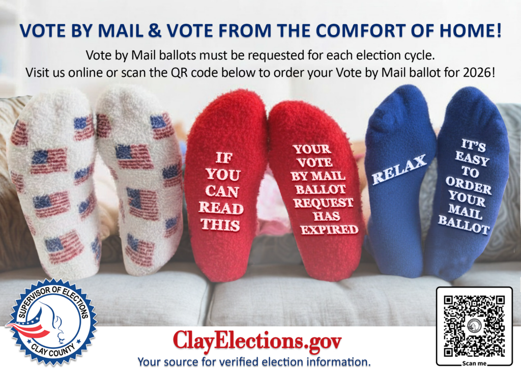 Three pairs of feet in fuzzy socks are propped up on a coffee table. From left to right, the first pair are white with an American flag pattern, the middle are red and read If you can read this...your Vote by Mail ballot has expired. The last pair is blue and reads Relax...It's easy t0 order your Mail ballot. The text below that gives the website and a QR code to request a Mail ballot.